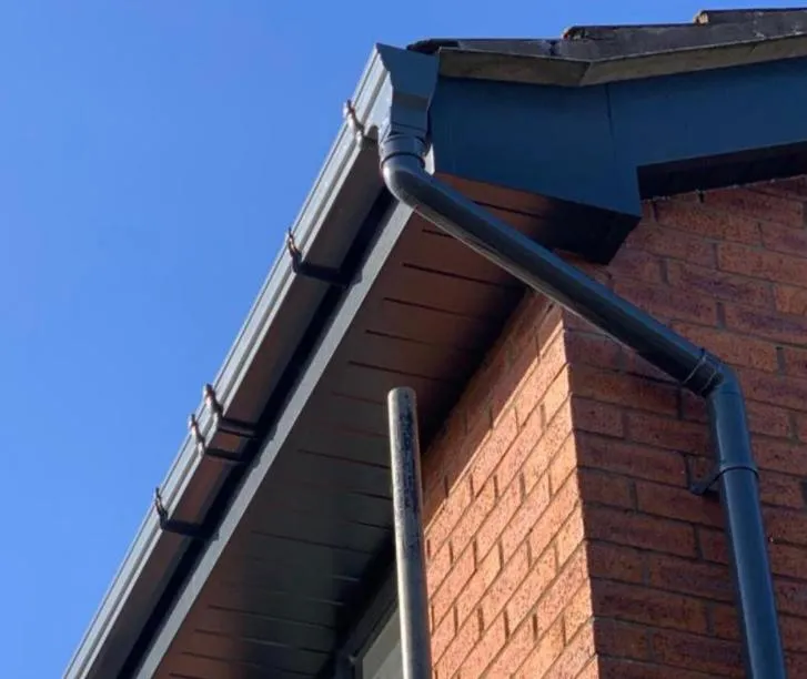 Dark grey UPVC fascias, soffits and guttering
